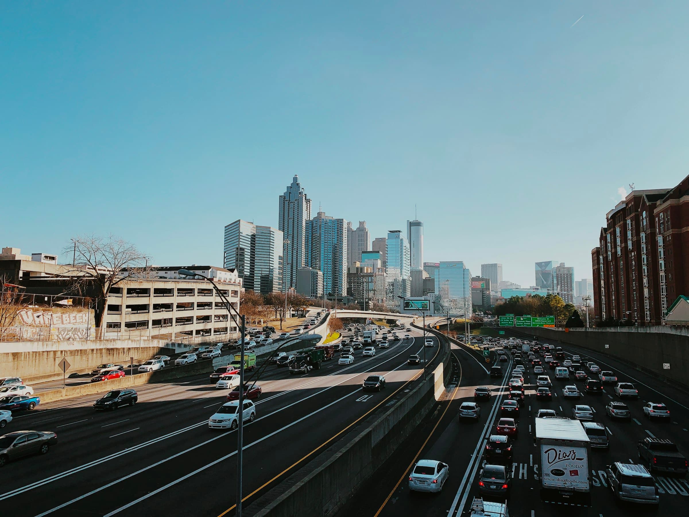 Traffic on the Downtown Connector with the Atlanta skyline ahead on a clear day