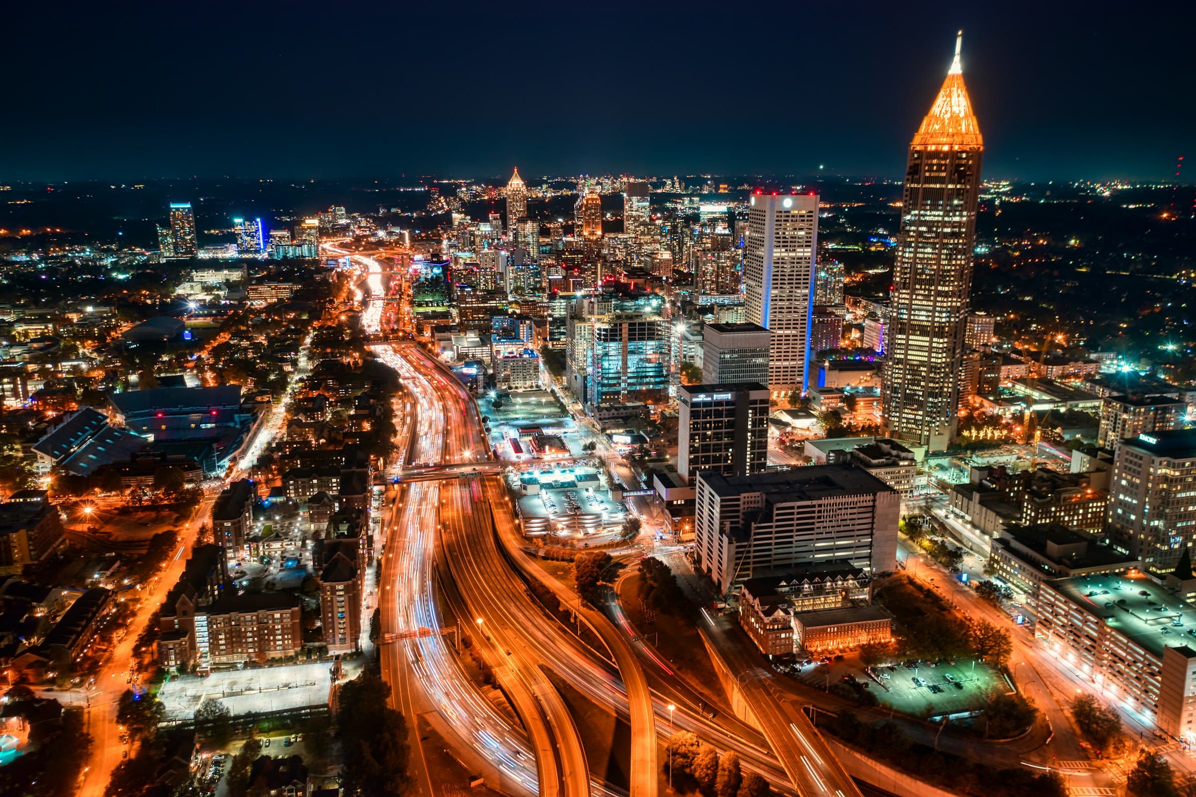 Atlanta at night, with light trails from traffic on the Downtown Connector